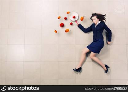 Businesswoman with pan. Funny woman in business suit with pan in hand