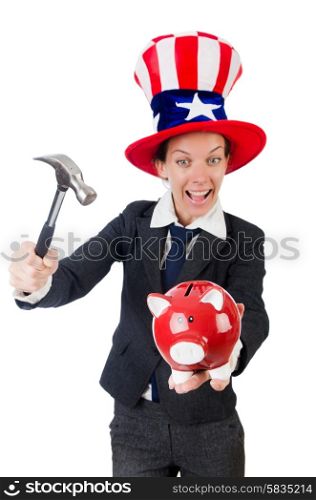 Businesswoman with piggy bank and hammer isolated on white