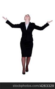 Businesswoman with raised arms