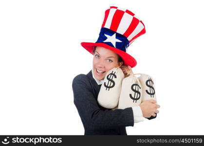 Businesswoman with sacks of money on white