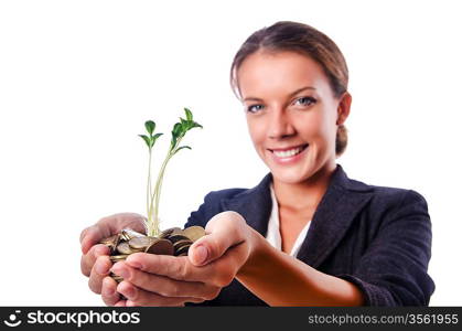 Businesswoman with seedling on white