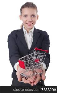 Businesswoman with shopping cart on white