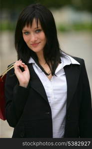 Businesswoman with store bags