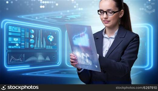 Businesswoman with tablet in data mining concept