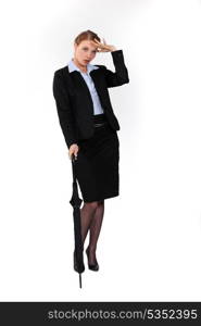 Businesswoman with umbrella