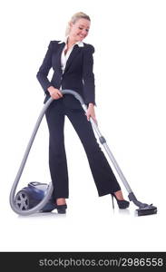 Businesswoman with vacuum cleaner on white