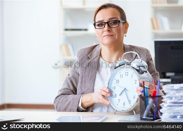 Businesswoman workaholic trying to finish urgent paperwork