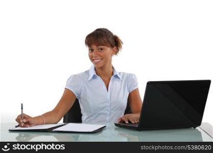 businesswoman working at her desk