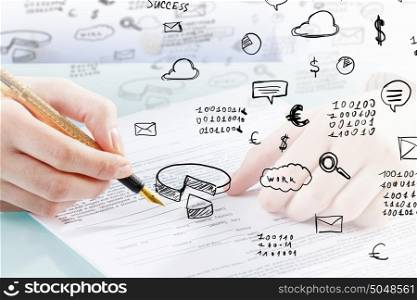 Businesswoman working at her desk. Close up of female hand writing with pen business sucess strategy