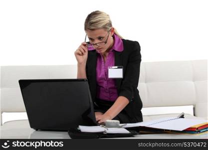 businesswoman working at home on her laptop
