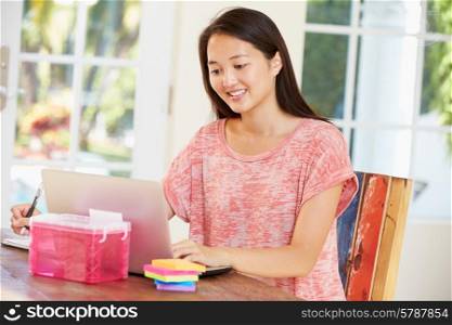 Businesswoman Working In Office At Home