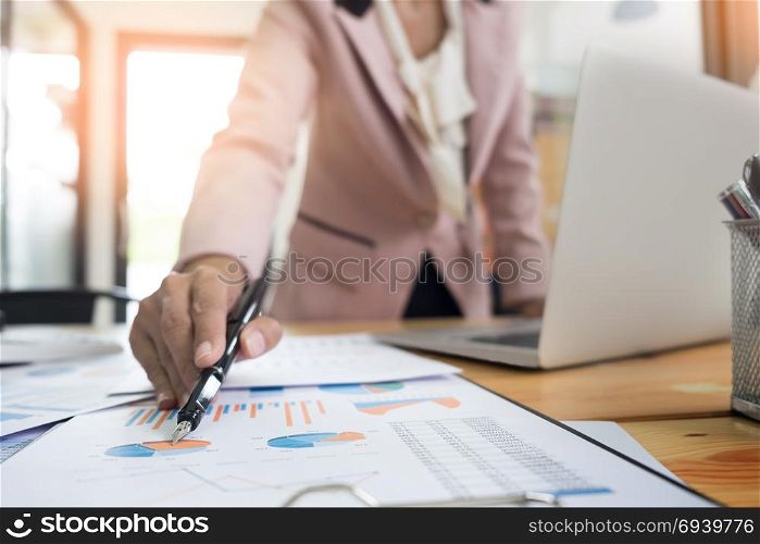 Businesswoman working in office typing on keyboard, female hands text message, work process concept in workspace, writing text on the open monitor.