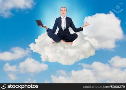 Businesswoman working in the sky and meditating