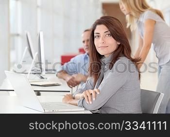 Businesswoman working on laptop computer