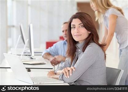 Businesswoman working on laptop computer