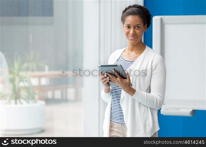 Businesswoman working with a tablet in offfice