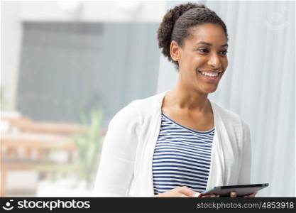 Businesswoman working with a tablet in offfice
