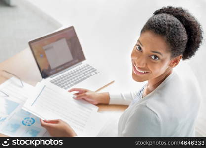 Businesswoman working with laptop in offfice