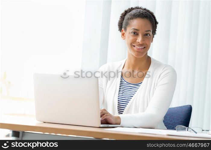 Businesswoman working with laptop in offfice
