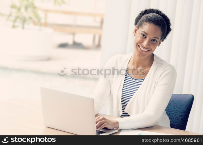 Businesswoman working with laptop in offfice