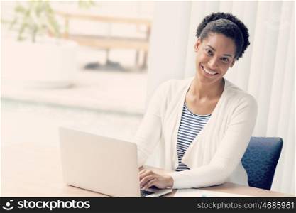 Businesswoman working with laptop in offfice