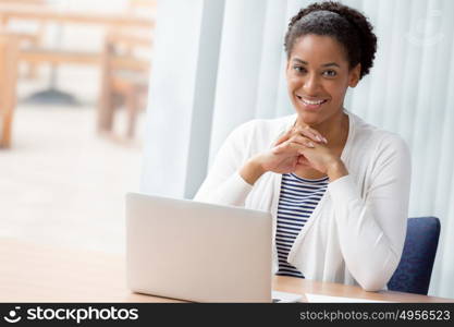 Businesswoman working with laptop in offfice