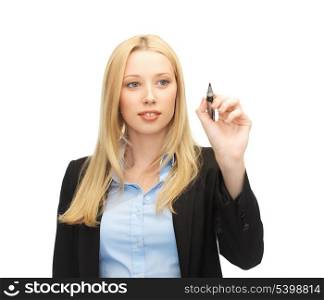 businesswoman writing something in the air with marker