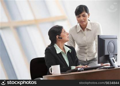 Businesswomen conversing about new plan