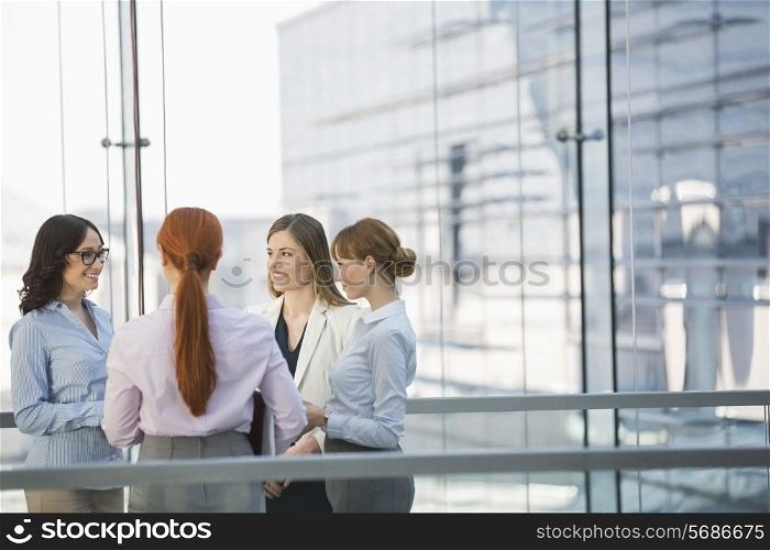 Businesswomen conversing in office