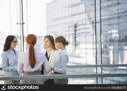 Businesswomen conversing in office