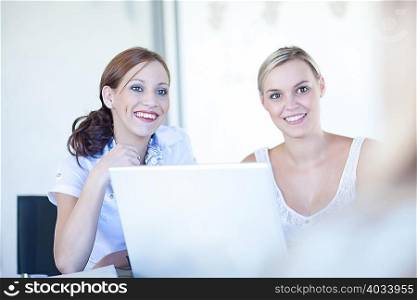 Businesswomen working on laptop