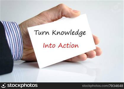 Bussines man hand with text Turn Knowledge Into Action