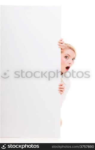 Bussines woman looking surprised scared, blonde girl with blank presentation board banner sign billboard copy space for text. Isolated on white background.