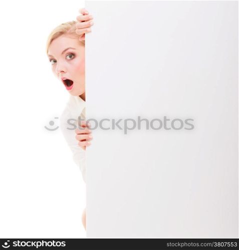 Bussines woman looking surprised scared, blonde girl with blank presentation board banner sign billboard copy space for text. Isolated on white background.