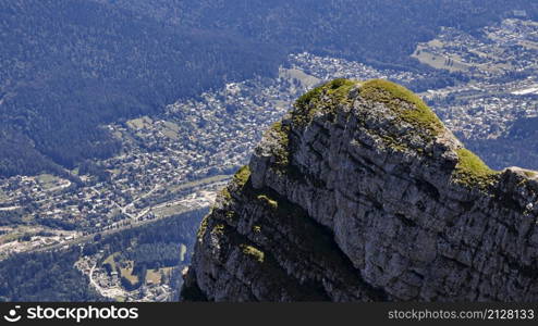 Busteni city behind the mountain peak