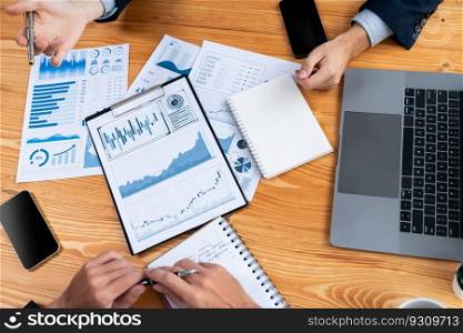 Busy analyst team in office analyzing financial data analysis for marketing strategy in workspace using BI dashboard with graph and chart to improve business performance. Entity. Busy analyst team in office analyzing financial data analysis. Entity