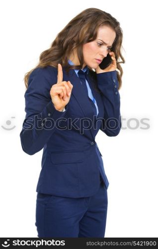 Busy business woman talking cell phone