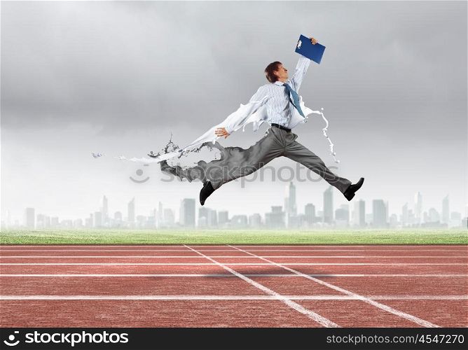 Busy businessman. Funny young office worker running in a hurry