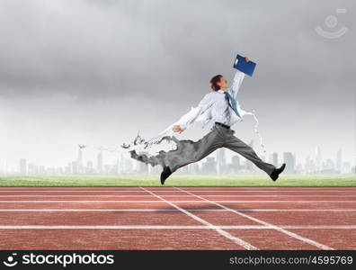 Busy businessman. Funny young office worker running in a hurry