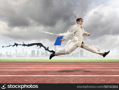 Busy businessman. Funny young office worker running in a hurry