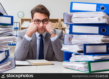 Busy businessman under stress due to excessive work