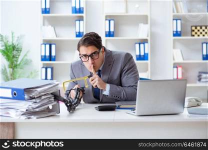 Busy employee chained to his office desk