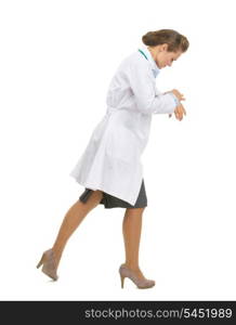 Busy medical doctor woman going sideways