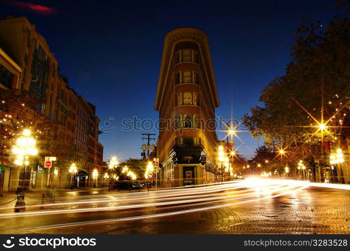 Busy night roadway in Gastown, Vancouver Canada.