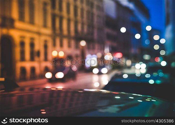 Busy road at night, Milan, Italy