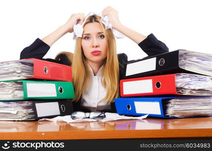 Busy woman with stacks of paper