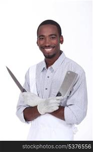 Butcher holding knives