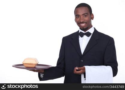 Butler serving a takeout burger