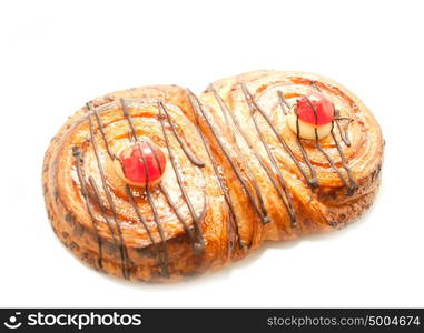 Butter bun with chocolate and cream isolated on white