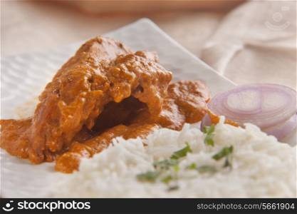 Butter chicken served with rice